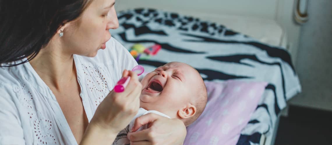 How to give syrup to baby who refuses?