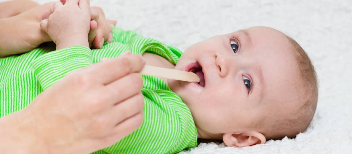 How do I know if my baby has a sore throat?