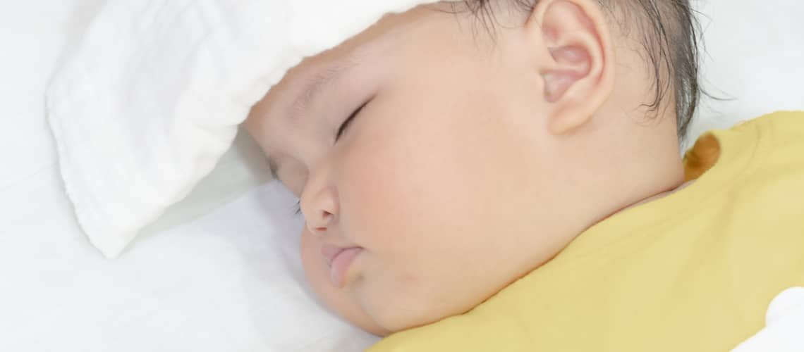 How to reduce fever in child without medicine?