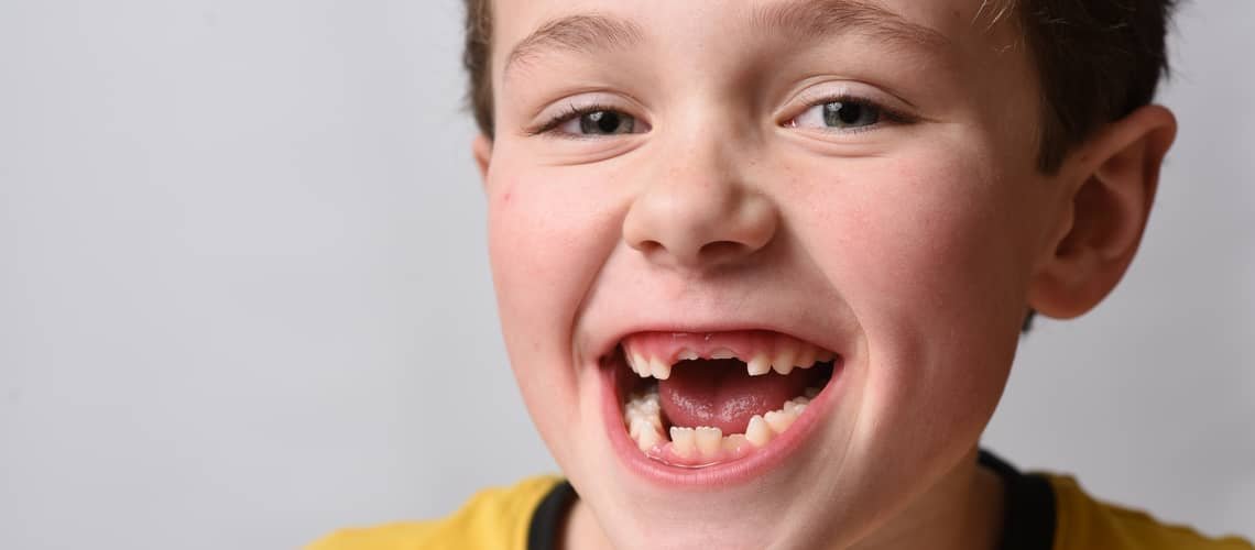 When do baby teeth fall out?