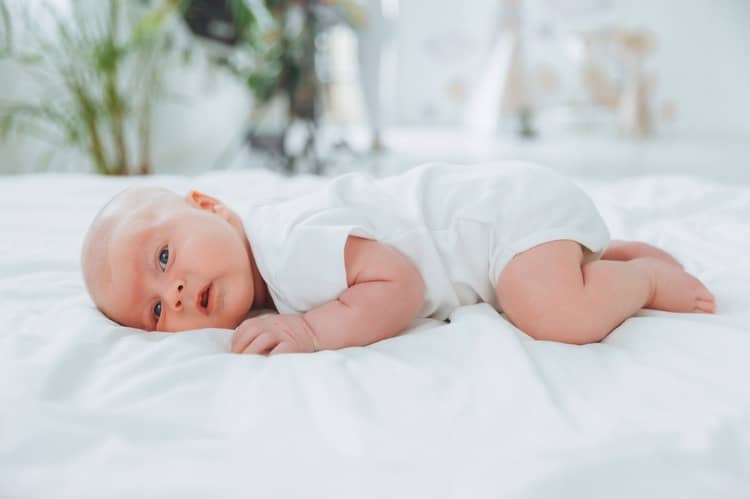 What can a 2-month-old baby do?