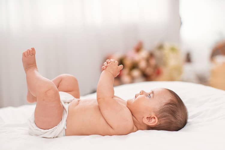 What can a 4-month-old baby do?