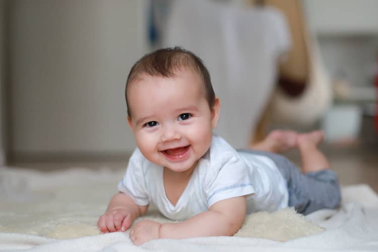 What can a 6-month-old baby do?