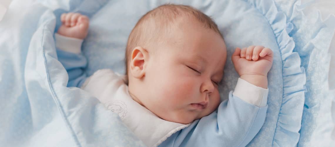 How should a newborn sleep?