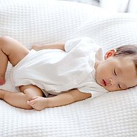 3-month-old baby in a crib