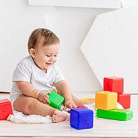 6-month-old baby with toys